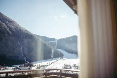 a view of a snow covered mountain from a window at HoferVals in Valles