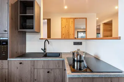 a kitchen with a sink and a counter top at Villa Lara Laerche in Castelrotto
