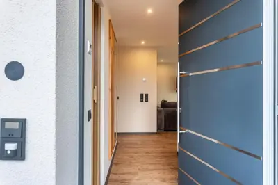 a door leading to a hallway with a living room at Villa Lara Laerche in Castelrotto