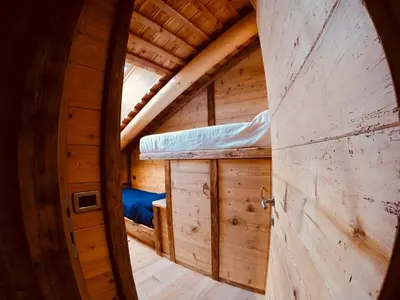 an inside view of a cabin with two bunk beds at Stunning Luxury House in Cortina dʼAmpezzo