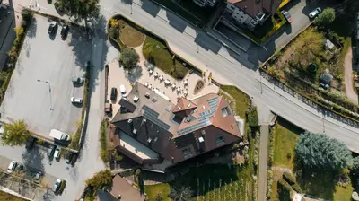 an overhead view of a house with a yard at Goldenhof in Ora/Auer