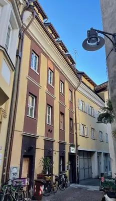 a building with bikes parked in front of it at Heart of Bolzano in Bolzano