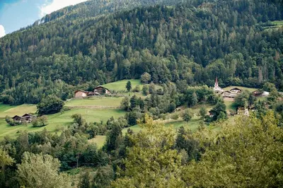 an aerial view of a village in a mountain at Haslingerhof - Ferienwohnung Ortler in Saltusio