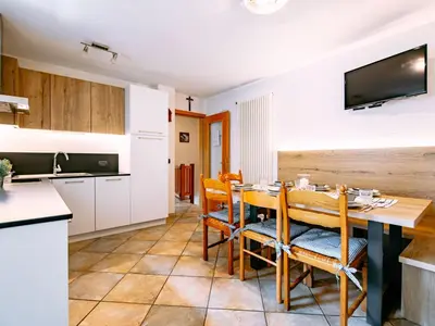 a room with two beds and a couch at Holiday Home Punta Emma by Interhome in Pera