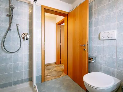 a bathroom with a sink and a shower at Holiday Home Punta Emma by Interhome in Pera