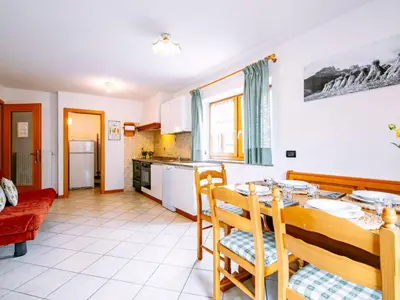 a town on a hill with mountains in the background at Apartment Stabler by Interhome in Pera
