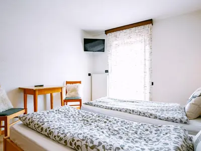 a bathroom with a shower with a toilet and a sink at Apartment Stabler by Interhome in Pera