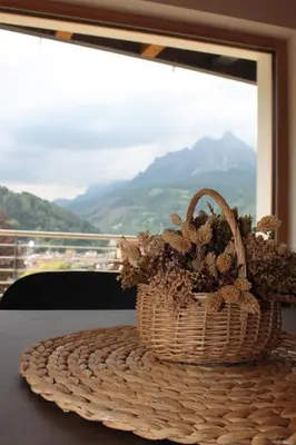 a basket sitting on a table next to a window at VILLA IRIS 6 persone in Transacqua