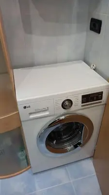 a washer and dryer in a small room at Apartment Anna in Merano