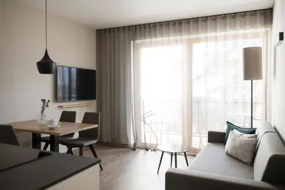 a living room with a couch and a table at Residence Sonja in Rablà