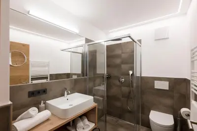 a bathroom with a sink and a shower at Residence Sonja in Rablà