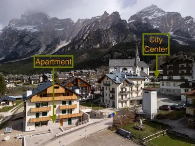 a city with a city center and a mountain at Arga' New Alpine Design Apartment Central & Scenic Views in San Vito di Cadore
