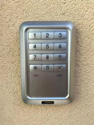 a cell phone is attached to a wall at Villa Jasmine in Bolzano
