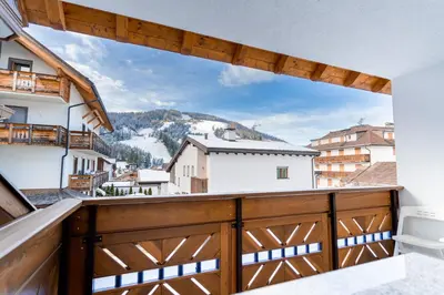 a balcony with a view of the mountains at Residence Villa Toni in San Vigilio Di Marebbe