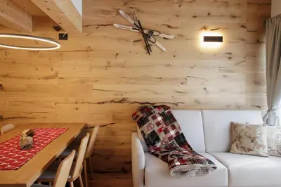 a hallway with a door with the number on it at ALPINE LOFT - Residence Veronza con piscina, Dolomiti Affitti in Cavalese