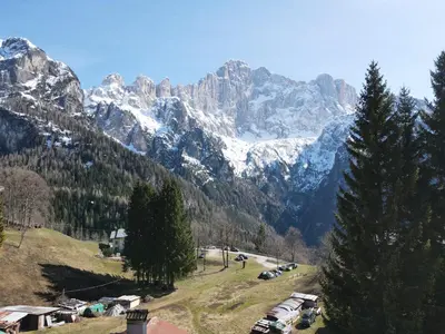 a view of a mountain range with snow covered mountains at Tabià Su'n Coi in Alleghe