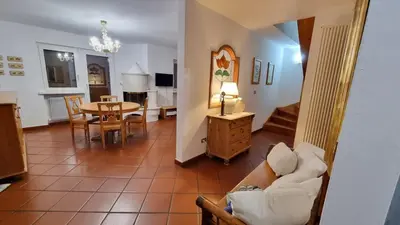 a living room with a couch and a table at Anto in Campitello di Fassa