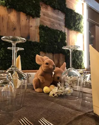 two stuffed animals sitting on top of a table at Rifugio Caltena in Fiera di Primiero