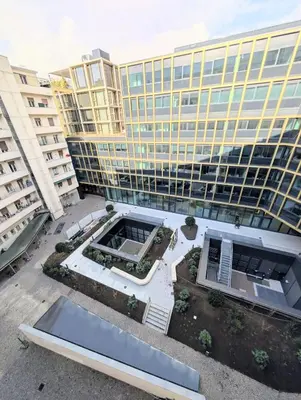 an overhead view of a large building with buildings at BozenApartments Garibaldi in Bolzano