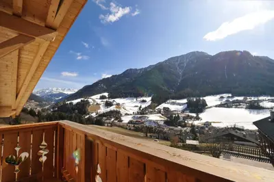 a view from the balcony of a ski resort at Mountain Apartment Hapeli in Ortisei
