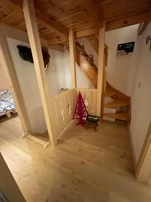 an overhead view of a room with wooden floors at Love Mountain House in Campestrin