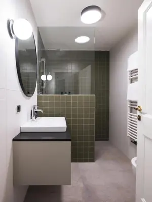 a bathroom with a sink and a mirror at Hotel Bad Waldbrunn in Monguelfo