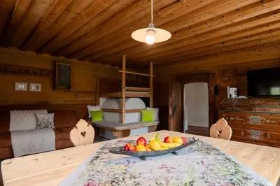 a bowl of fruit on a table in a room at zuLAVOGL in Kastelruth
