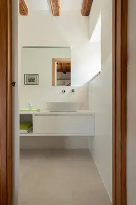 a bathroom with a sink and a mirror at zuLAVOGL in Kastelruth
