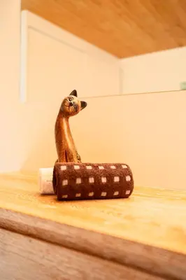 a figurine of a cat sitting on top of a counter at zuLAVOGL in Kastelruth