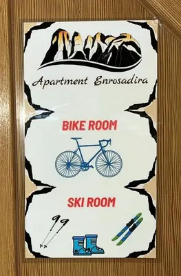 a sign that says bike room ski room at Apartment Enrosadira in Taibon