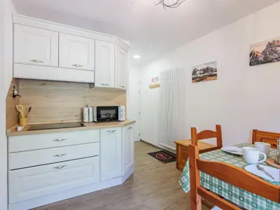 a bunk bed room with two bunk beds at Apartment Penia 2-3 by Interhome in Canazei