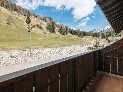 a view of the road from the balcony of a house at Apartment Penia 2-3 by Interhome in Canazei