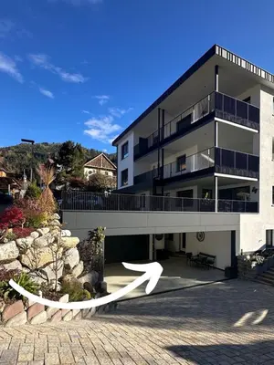 a large building with a walkway in front of it at Apartment Wörer in Perca