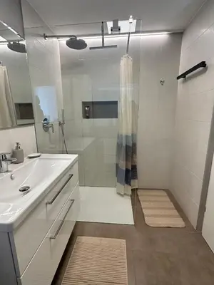 a bathroom with a shower and a sink at Apartment Wörer in Perca