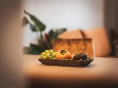 a bowl of fruit on top of a table at Paradeis Apartments in Mühlbach