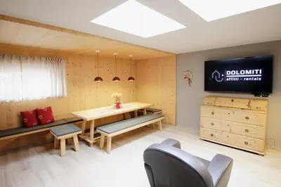 a small kitchen with a sink and a table at VILLA CAVAZZAL - 2 camere, 2 bagni, garage Dolomiti Affitti in Cavalese