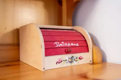 a wooden dresser with the words schizophrenia written on it at Trilo Fiéma in Panchia