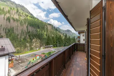 a balcony with a view of a mountain at Col da Daut 8 in Rocca Pietore