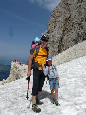 a man and a child standing on top of a mountain at Cedepuent de Sot in Selva di Val Gardena