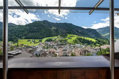 a view of a town from a window at Panorama Apartments Walter in Ortisei