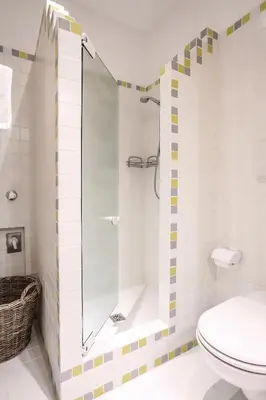 a bathroom with a shower and a toilet at Andreas Hofer Residence in Bolzano