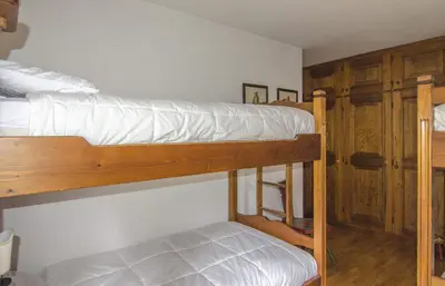 a couple of bunk beds in a room at Ca de Rupe in Chiave