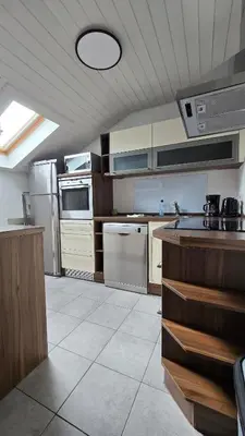 a kitchen with a sink and a stove at Hike, Bike & More in Parcines