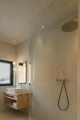 a bathroom with a shower and a sink at Chalet Herol in Luson
