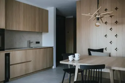 a wooden cabinet with four stars on the wall at Brondstott Farm & Suites Kronplatz in Riscone