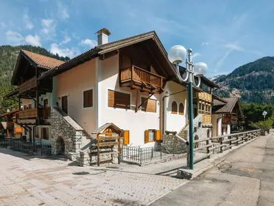 a building with a street light in front of it at Apartment Corte dei Larici by Interhome in Campitello di Fassa