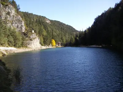 a large lake in the middle of a mountain at Appartamento-Wohnung Amblar in Cavareno