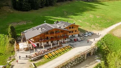 an overhead view of a large building with a restaurant at Grossberghütte in Maranza