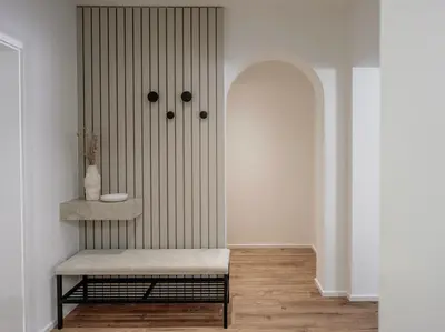 a room with a bench in front of a door at Dolomina in Funes