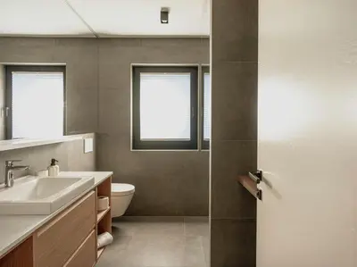a bathroom with a sink and a toilet at Dolomina in Funes